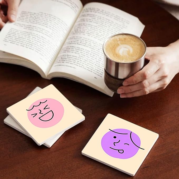 MAYCARI Cartoon Emotional Face Coasters Set of 6 Cork Backed Cute Coasters with Metal Holder Original Ceramic Surface Drink Cup Mats for Tabletop Protection Modern Desk Decoration Birthday Gifts