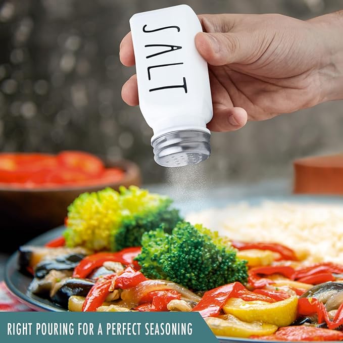 Farmhouse Salt and Pepper Shakers Set, a cute black and white premium glass shakers with stainless steel lids in a black metal holder, perfect for adding a vintage kitchen decor charm, great as a gift