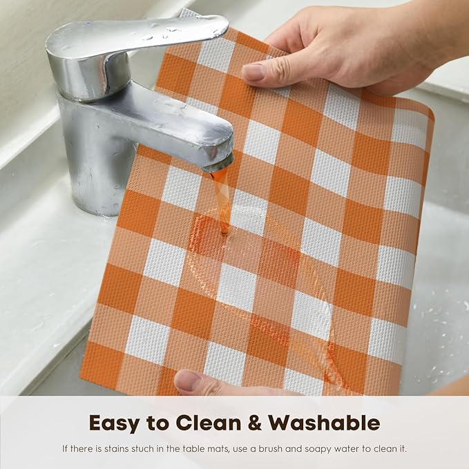 Artoid Mode Buffalo Plaid Vinyl Placemats Set of 4, 12x18 Inch Washable Non-Slip Heat Resistant Plastic Place Mats for Party Dining Table, Orange/White