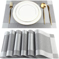 DACHUI Placemats Set of 4, Linen Look Woven Place Mats, Water Resistant, Heat Resistant, Washable, Durable Table Mats (Silver Grey)