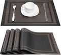 DACHUI Placemats Set of 4, Linen Look Woven Place Mats, Water Resistant, Heat Resistant, Washable, Durable Table Mats (Black Gold)
